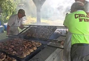 chilson firemen cooking chicken